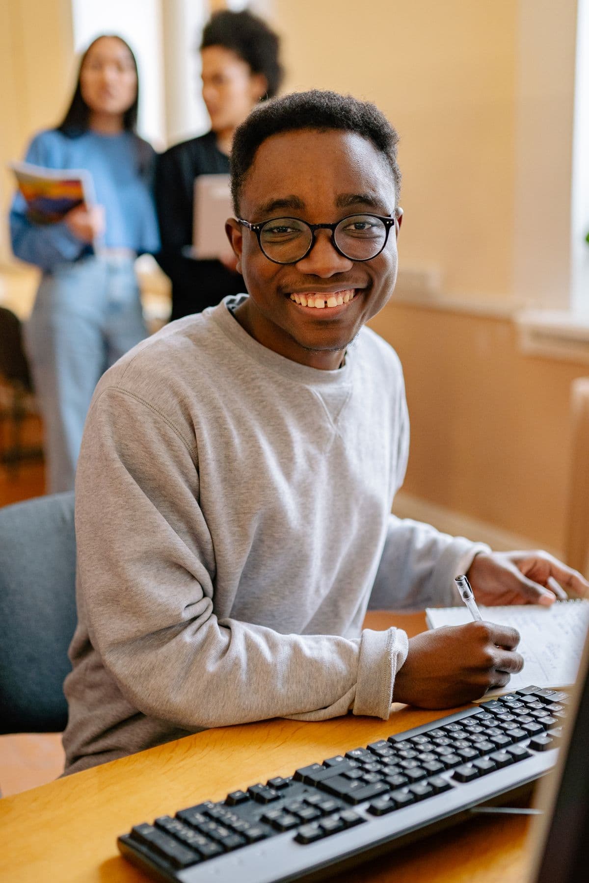 Student working at a desktop computer